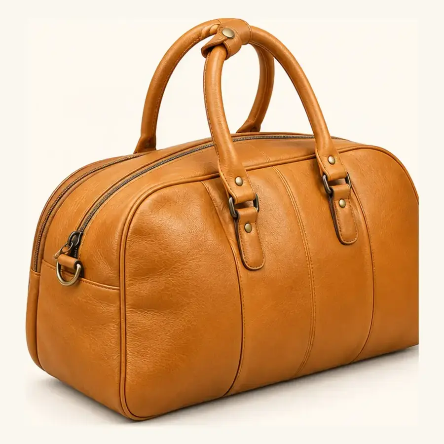 leather tan duffel bag – ua 156 front three quarter Leather Tan Duffel Bag UA-156 front three-quarter view